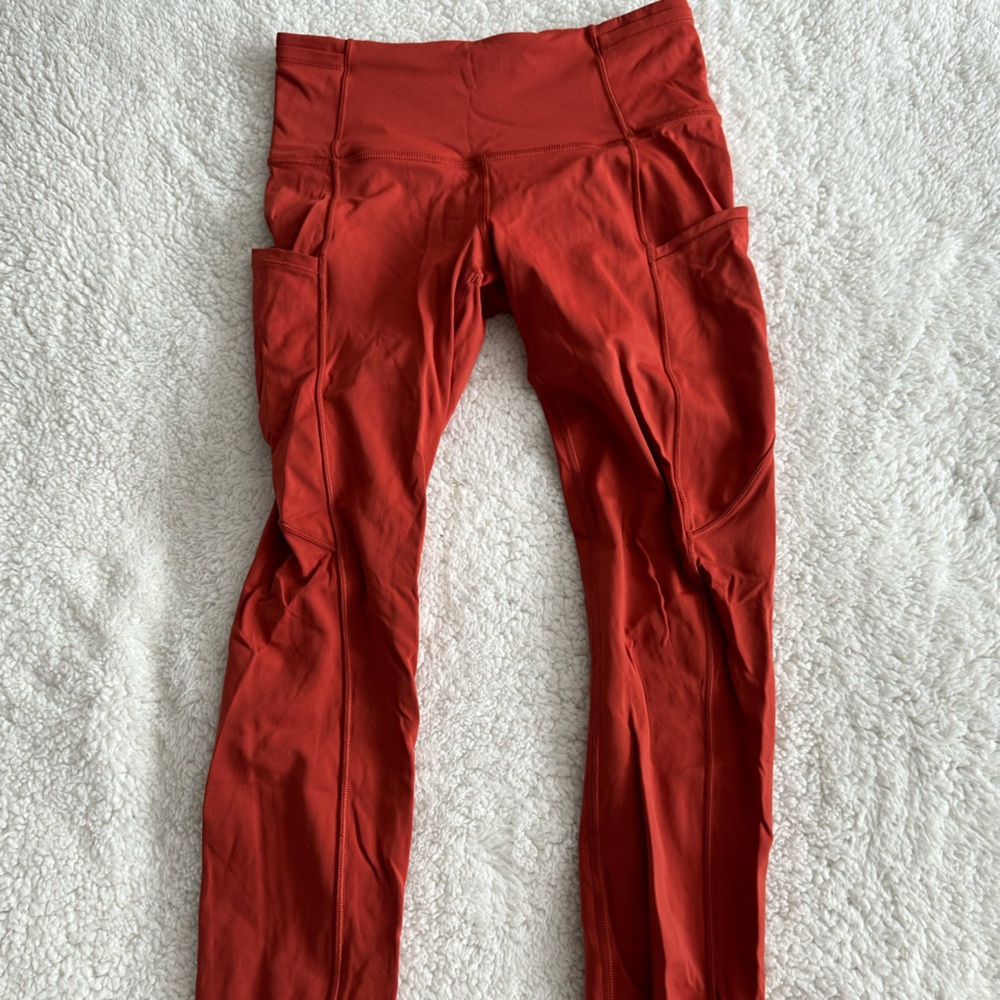 Lululemon leggings - size 2 orange - super cute and fitted, pockets